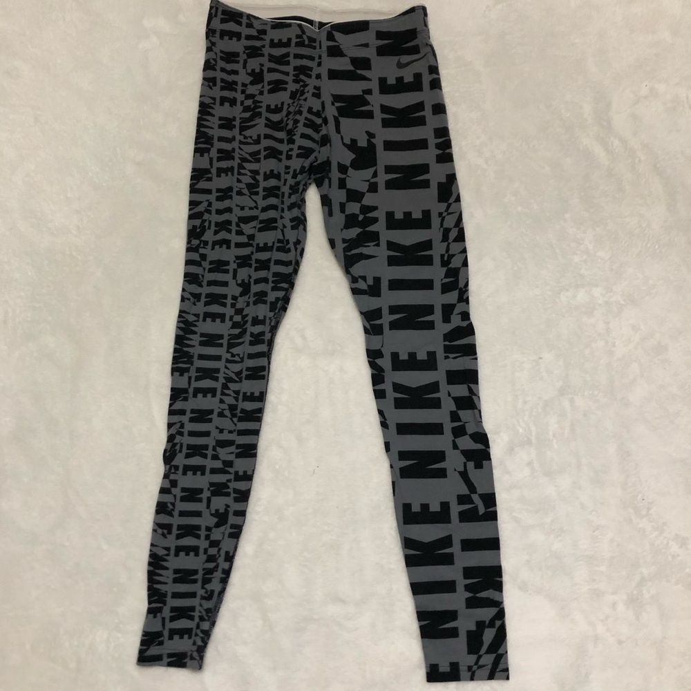 Grey and black Nike leggings